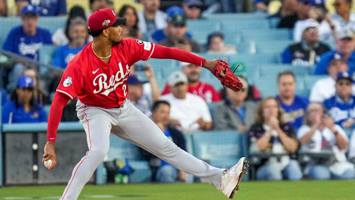 Cincinnati Reds starting pitcher Hunter Greene (21) throws a pitch in the first inning of the MLB National League Wild Card Game 1 between the Los Angeles Dodgers and the Cincinnati Reds at Dodger Stadium in Los Angeles on Tuesday, Sept. 30, 2025. The Dodgers won game 1 of the series, 10-5.