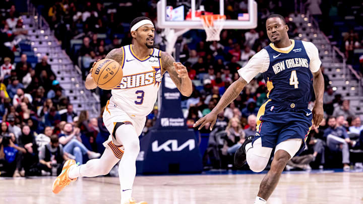 Dec 5, 2024; New Orleans, Louisiana, USA;  Phoenix Suns guard Bradley Beal (3) brings the ball up court against New Orleans Pelicans guard Javonte Green (4) during the second half  at Smoothie King Center. Mandatory Credit: Stephen Lew-Imagn Images