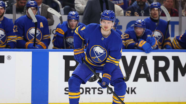 Apr 19, 2026; Buffalo, New York, USA; Buffalo Sabres defenseman Bowen Byram (4) looks to make a pass during the second period against the Boston Bruins in game one of the first round of the 2026 Stanley Cup Playoffs at KeyBank Center. Mandatory Credit: Timothy T. Ludwig-Imagn Images