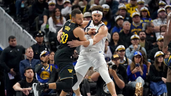 Nov 12, 2024; San Francisco, California, USA; Golden State Warriors guard Stephen Curry (30) is defended by Dallas Mavericks guard Klay Thompson (31) in the second quarter at the Chase Center. Mandatory Credit: Cary Edmondson-Imagn Images