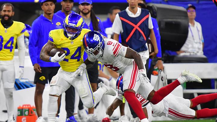 Sep 21, 2026; Inglewood, California, USA; Los Angeles Rams running back Blake Corum (24) runs against New York Giants safety Jevon Holland (8) during the fourth quarter at SoFi Stadium. Sep 21, 2026; Inglewood, California, USA; Los Angeles Rams running back Blake Corum (24) runs against New York Giants safety Jevon Holland (8) during the fourth quarter at SoFi Stadium.