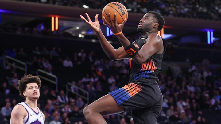 Dec 5, 2025; New York, New York, USA;  New York Knicks forward Mohamed Diawara (51) drives to the basket in the fourth quarter against the Utah Jazz at Madison Square Garden. Mandatory Credit: Wendell Cruz-Imagn Images