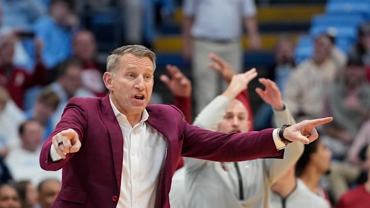 Dec 4, 2024; Chapel Hill, North Carolina, USA;  Alabama Crimson Tide head coach Nate Oats reacts in the second half at Dean E. Smith Center. Mandatory Credit: Bob Donnan-Imagn Images