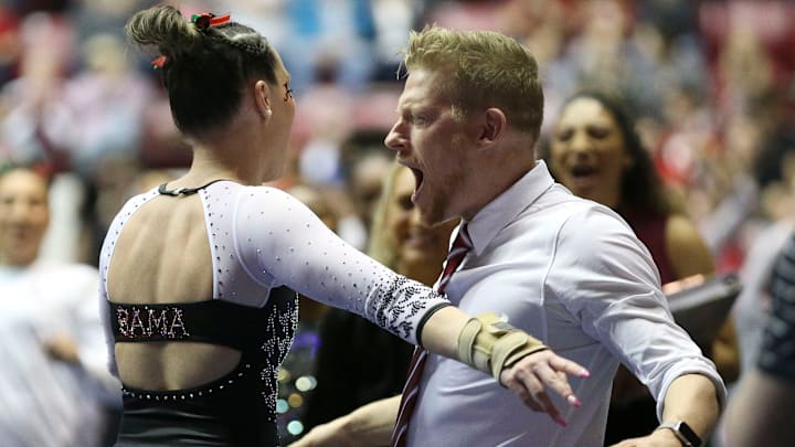 Feb 24, 2023; Tuscaloosa, AL, USA; Alabama gymnast Shallon Olsen celebrates her vault with assistant coach Justin Spring at Coleman Coliseum during the meet against LSU.
Gymnatics Alabama Vs Lsu Feb 24, 2023; Tuscaloosa, AL, USA; Alabama gymnast Shallon Olsen celebrates her vault with assistant coach Justin Spring at Coleman Coliseum during the meet against LSU.
Gymnatics Alabama Vs Lsu
