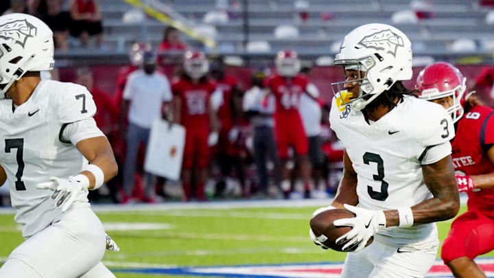 Bosco's wide receiver scores a touchdown in the second quarter of play. 
