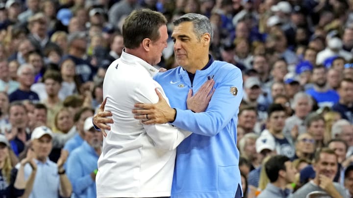 Apr 2, 2022; New Orleans, LA, USA; Kansas Jayhawks head coach Bill Self and Villanova Wildcats head coach Jay Wright shake hands before the game in the 2022 NCAA men's basketball tournament Final Four semifinals at Caesars Superdome. Mandatory Credit: Robert Deutsch-USA TODAY Sports