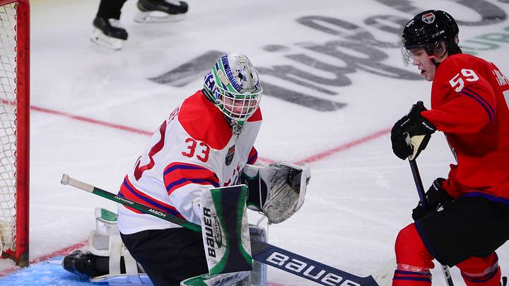Jan 25, 2023; Langley, BC, CANADA; CHL Top Prospects team white goaltender Scott Ratzlaff (33) defends against CHL Top Prospects team red forward Riley Heidt (27) during the second period in the 2023 CHL Top Prospects ice hockey game at Langley Events Centre. Mandatory Credit: Anne-Marie Sorvin-USA TODAY Sports Jan 25, 2023; Langley, BC, CANADA; CHL Top Prospects team white goaltender Scott Ratzlaff (33) defends against CHL Top Prospects team red forward Riley Heidt (27) during the second period in the 2023 CHL Top Prospects ice hockey game at Langley Events Centre. Mandatory Credit: Anne-Marie Sorvin-USA TODAY Sports