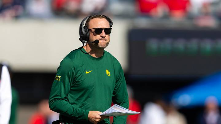 Nov 22, 2025; Tucson, Arizona, USA; Baylor Bears offensive coordinator Jake Spavital against the Arizona Wildcats at Casino Del Sol Stadium. Mandatory Credit: Mark J. Rebilas-Imagn Images