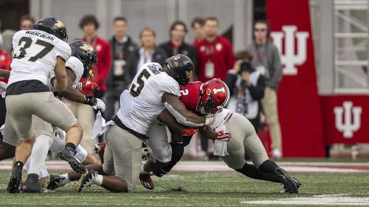 Nov 26, 2022; Bloomington, Indiana, USA;  Indiana Hoosiers running back Shaun Shivers (2) is tackled