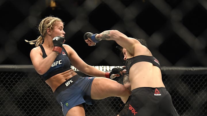 Paige VanZant (red gloves) fights Jessica-Rose Clark (blue gloves) during UFC Fight Night at Scottrade Center in 2018.