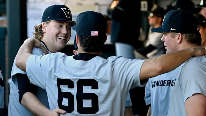 Vanderbilt pitcher Sawyer Hawks, left, jokes around with teammates before a NCAA college baseball game against Tennessee Tech at Hawkins Field Tuesday, Feb. 25, 2025, in Nashville, Tenn.