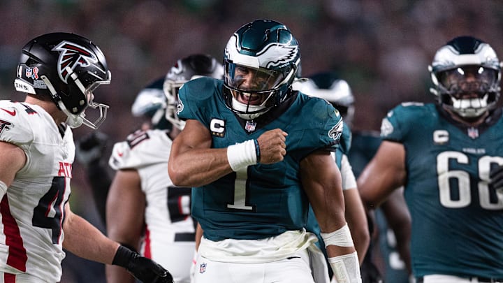 Sep 16, 2024; Philadelphia, Pennsylvania, USA; Philadelphia Eagles quarterback Jalen Hurts (1) reacts after a first down run against the Atlanta Falcons during the fourth quarter at Lincoln Financial Field. Mandatory Credit: Bill Streicher-Imagn Images