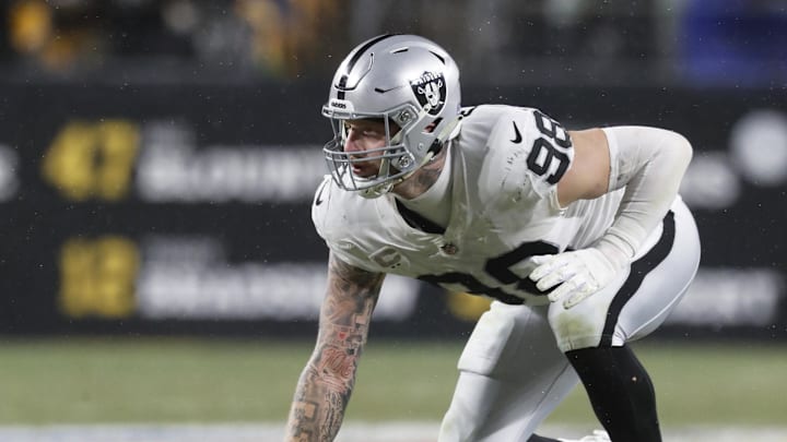 Dec 24, 2022; Pittsburgh, Pennsylvania, USA;  Las Vegas Raiders defensive end Maxx Crosby (98) at the line of scrimmage against the Pittsburgh Steelers during the third quarter at Acrisure Stadium. The Steelers won 13-10. Mandatory Credit: Charles LeClaire-Imagn Images