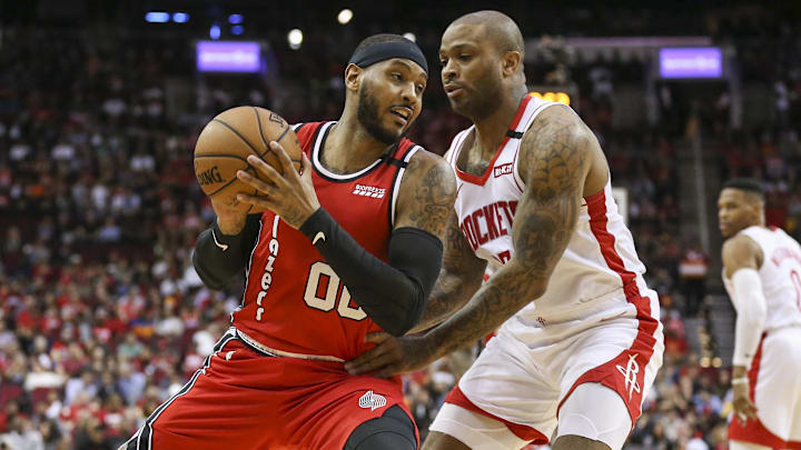 Jan 15, 2020; Houston, Texas, USA; Portland Trail Blazers forward Carmelo Anthony (00) controls the ball against Houston Rockets forward PJ Tucker (17) during the first quarter at Toyota Center. Mandatory Credit: Troy Taormina-Imagn Images Jan 15, 2020; Houston, Texas, USA; Portland Trail Blazers forward Carmelo Anthony (00) controls the ball against Houston Rockets forward PJ Tucker (17) during the first quarter at Toyota Center. Mandatory Credit: Troy Taormina-Imagn Images
