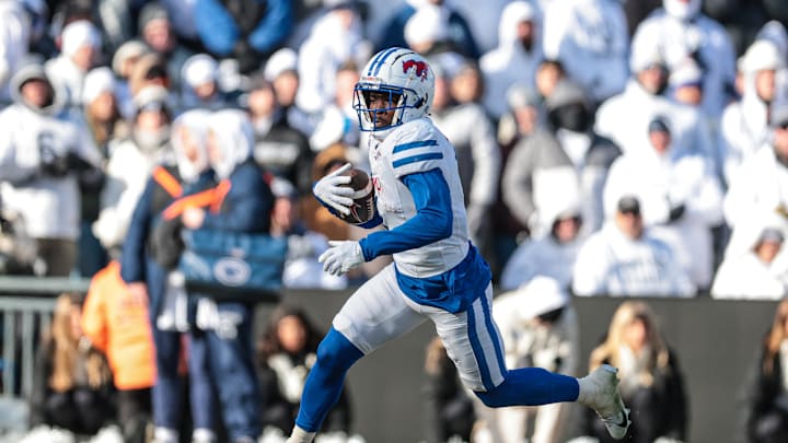 Dec 21, 2024; University Park, Pennsylvania, USA; Southern Methodist Mustangs running back Brashard Smith (1) carries the ball during the first half against the Penn State Nittany Lions at Beaver Stadium. Mandatory Credit: Vincent Carchietta-Imagn Images Dec 21, 2024; University Park, Pennsylvania, USA; Southern Methodist Mustangs running back Brashard Smith (1) carries the ball during the first half against the Penn State Nittany Lions at Beaver Stadium. Mandatory Credit: Vincent Carchietta-Imagn Images