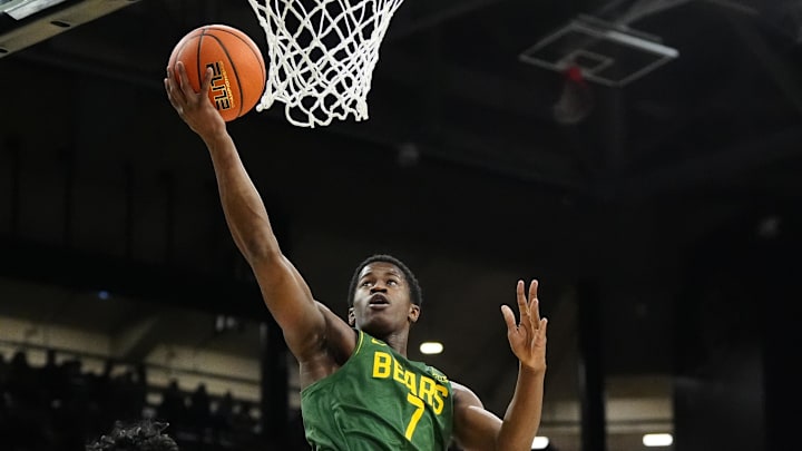 Feb 22, 2025; Boulder, Colorado, USA; Baylor Bears guard VJ Edgecombe (7) shoots the ball in the first half against the Colorado Buffaloes at the CU Events Center. Mandatory Credit: Ron Chenoy-Imagn Images