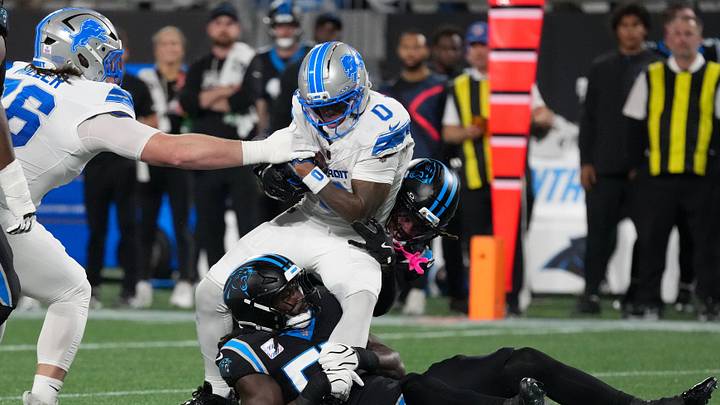 Oct 4, 2026; Charlotte, North Carolina, USA; Carolina Panthers cornerback Will Lee III (24) and linebacker Devin Lloyd (55) tackle Detroit Lions running back Jahmyr Gibbs (0) during the second quarter at Bank of America Stadium. Mandatory Credit: Jim Dedmon-Imagn Images Oct 4, 2026; Charlotte, North Carolina, USA; Carolina Panthers cornerback Will Lee III (24) and linebacker Devin Lloyd (55) tackle Detroit Lions running back Jahmyr Gibbs (0) during the second quarter at Bank of America Stadium. Mandatory Credit: Jim Dedmon-Imagn Images