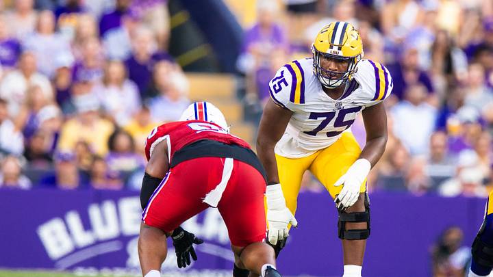 LSU Tigers offensive tackle Weston Davis lines up against Louisiana Tech Bulldogs defensive lineman Jayden Madkins. LSU Tigers offensive tackle Weston Davis lines up against Louisiana Tech Bulldogs defensive lineman Jayden Madkins.