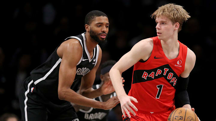 Apr 10, 2024; Brooklyn, New York, USA; Toronto Raptors guard Gradey Dick (1) controls the ball against Brooklyn Nets forward Mikal Bridges (1) during the second quarter at Barclays Center. Mandatory Credit: Brad Penner-Imagn Images Apr 10, 2024; Brooklyn, New York, USA; Toronto Raptors guard Gradey Dick (1) controls the ball against Brooklyn Nets forward Mikal Bridges (1) during the second quarter at Barclays Center. Mandatory Credit: Brad Penner-Imagn Images