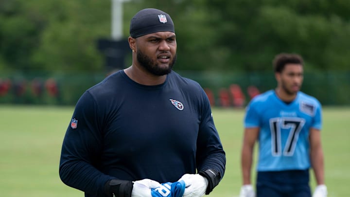 Tennessee Titans tackle Dan Moore Jr. (75) finishes up practice during OTAs at Ascension Saint Thomas Sports Park in Nashville, Tenn., Wednesday, May 28, 2025. Tennessee Titans tackle Dan Moore Jr. (75) finishes up practice during OTAs at Ascension Saint Thomas Sports Park in Nashville, Tenn., Wednesday, May 28, 2025.