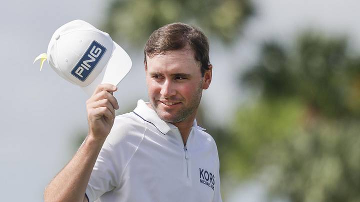 Mar 4, 2024; Palm Beach Gardens, Florida, USA; Austin Eckroat acknowledges the crowds applause after winning the Cognizant Classic in The Palm Beaches golf tournament. Mandatory Credit: Reinhold Matay-Imagn Images