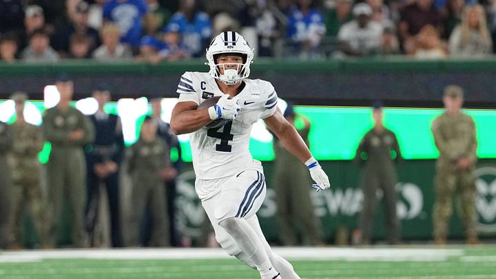 Sep 19, 2026; Fort Collins, Colorado, USA; BYU Cougars running back Lj Martin (4) runs the ball against the Colorado State Rams at Sonny Lubick Field at Canvas Stadium. Mandatory Credit: Andrew Rydland-Imagn Images Sep 19, 2026; Fort Collins, Colorado, USA; BYU Cougars running back Lj Martin (4) runs the ball against the Colorado State Rams at Sonny Lubick Field at Canvas Stadium. Mandatory Credit: Andrew Rydland-Imagn Images