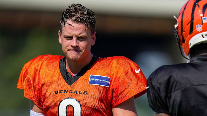 Cincinnati Bengals quarterback Joe Burrow (9) sets up between plays during a preseason training camp practice in downtown Cincinnati on Wednesday, July 30, 2025.