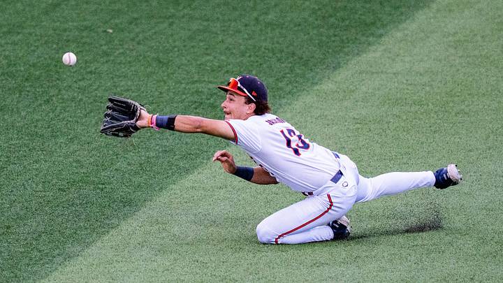 Virginia outfielder Zach Jackson (13) catches the ball during an NCAA Baseball Regional game between Virginia and Jax State at Pete Taylor Park in Hattiesburg, Miss., on Friday, May 29, 2026. Virginia outfielder Zach Jackson (13) catches the ball during an NCAA Baseball Regional game between Virginia and Jax State at Pete Taylor Park in Hattiesburg, Miss., on Friday, May 29, 2026.