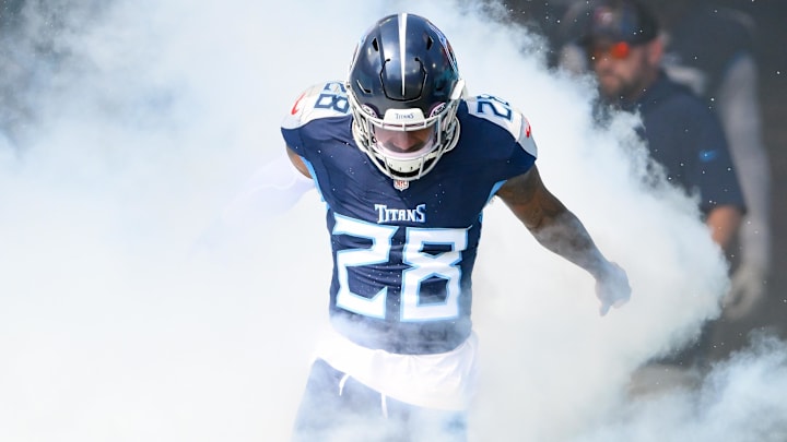 Oct 13, 2024; Nashville, Tennessee, USA;  Tennessee Titans safety Quandre Diggs (28) runs out during player introductions against the Indianapolis Colts at Nissan Stadium. Mandatory Credit: Steve Roberts-Imagn Images