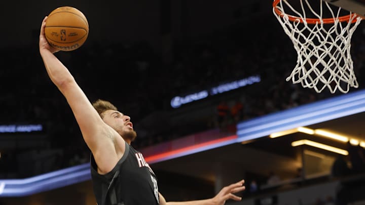 Feb 4, 2024; Minneapolis, Minnesota, USA; Houston Rockets center Alperen Sengun (28) dunks against