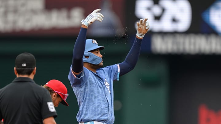 Mar 29, 2025; Washington, District of Columbia, USA; Washington Nationals outfielder James Wood (29) reacts after hitting a double during the fifth inning against the Philadelphia Phillies at Nationals Park. 