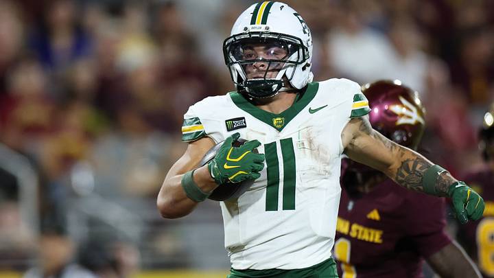 Oct 3, 2026; Tempe, Arizona, USA; Baylor Bears running back Caden Knighten (11) scores a touchdown against the Arizona State Sun Devils during the third quarter at Mountain America Stadium. Mandatory Credit: Anna Carrington-Imagn Images Oct 3, 2026; Tempe, Arizona, USA; Baylor Bears running back Caden Knighten (11) scores a touchdown against the Arizona State Sun Devils during the third quarter at Mountain America Stadium. Mandatory Credit: Anna Carrington-Imagn Images