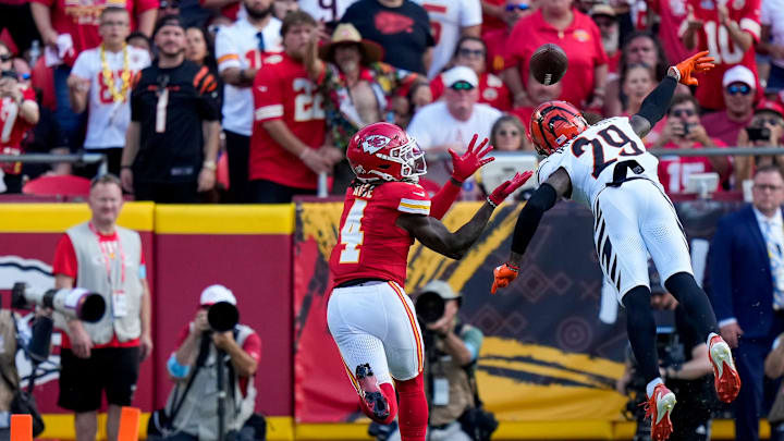 Kansas City Chiefs wide receiver Rashee Rice (4) catches a deep pass over the hands of Cincinnati Bengals cornerback Cam Taylor-Britt (29) for a touchdown in the second quarter of the NFL Week 2 game between the Kansas City Chiefs and the Cincinnati Bengals at Arrowhead Stadium in Kansas City on Sunday, Sept. 15, 2024. The Bengals led 16-10 at halftime.