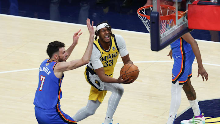 Jun 19, 2025; Indianapolis, Indiana, USA; Indiana Pacers center Myles Turner (33) drives to the basket against Oklahoma City Thunder forward Chet Holmgren (7) in the first quarter during game six of the 2025 NBA Finals at Gainbridge Fieldhouse. Mandatory Credit: Trevor Ruszkowski-Imagn Images