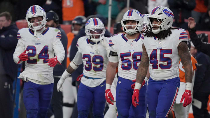 Buffalo Bills safety Cole Bishop, cornerback Cam Lewis, linebacker Matt Milano, and linebacker Shaq Thompson head to the line of scrimmage during second-half action at Empower Field at Mile High in Denver, Colorado on Jan. 17, 2026. Buffalo Bills safety Cole Bishop, cornerback Cam Lewis, linebacker Matt Milano, and linebacker Shaq Thompson head to the line of scrimmage during second-half action at Empower Field at Mile High in Denver, Colorado on Jan. 17, 2026.
