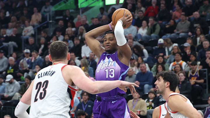 Feb 24, 2025; Salt Lake City, Utah, USA; Utah Jazz guard Isaiah Collier (13) passes the ball over the against the Portland Trail Blazers during the first half at Delta Center. Mandatory Credit: Rob Gray-Imagn Images
