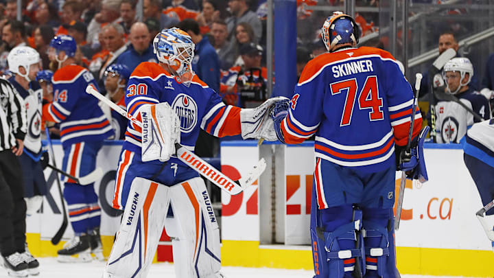Edmonton Oilers goaltender Calvin Pickard (30) replaces goaltender Stuart Skinner (74) after he gave up 5 goals on 13 shots against the Winnipeg Jets