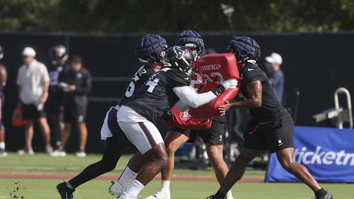 Jul 24, 2025; Houston, TX, USA; Houston Texans tight end Dalton Schultz (86) and tackle Cam Robinson (74) and tight end Brevin Jordan (9) during training camp at Houston Methodist Training Center. Mandatory Credit: Troy Taormina-Imagn Images