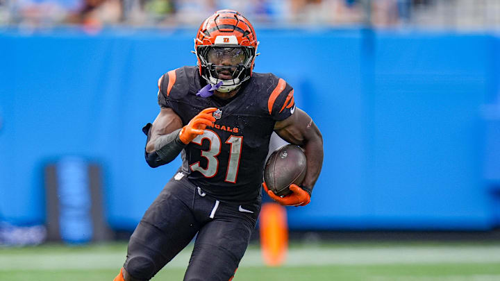 Sep 29, 2024; Charlotte, North Carolina, USA; Cincinnati Bengals running back Zack Moss (31) runs for yardage against the Carolina Panthers during the third quarter at Bank of America Stadium. Mandatory Credit: Jim Dedmon-Imagn Images Sep 29, 2024; Charlotte, North Carolina, USA; Cincinnati Bengals running back Zack Moss (31) runs for yardage against the Carolina Panthers during the third quarter at Bank of America Stadium. Mandatory Credit: Jim Dedmon-Imagn Images
