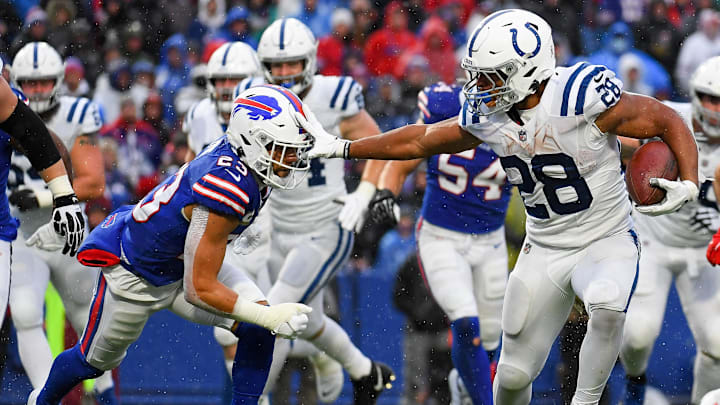 Nov 21, 2021; Orchard Park, New York, USA; Indianapolis Colts running back Jonathan Taylor (28) and Buffalo Bills safety Micah Hyde (23) during the second half at Highmark Stadium. Mandatory Credit: Rich Barnes-Imagn Images