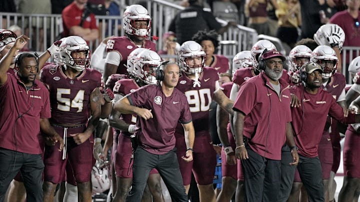 Sep 21, 2024; Tallahassee, Florida, USA; Florida State Seminoles head coach Mike Norvell and his team watch the time tick off of the clock during the fourth quarter against the California Golden Bears at Doak S. Campbell Stadium. Mandatory Credit: Melina Myers-Imagn Images