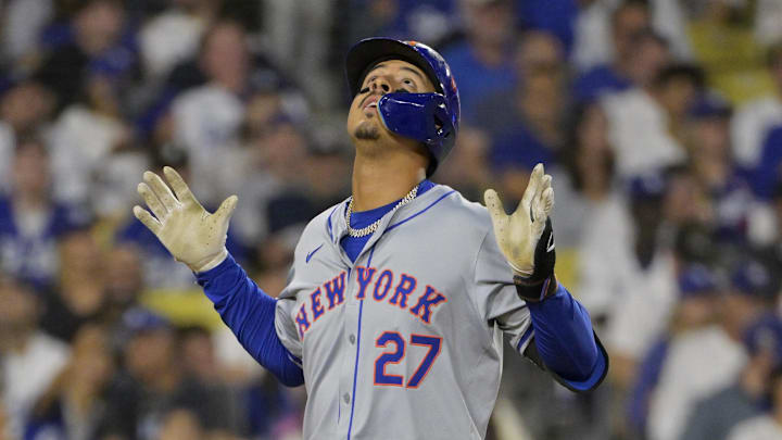 Oct 20, 2024; Los Angeles, California, USA; New York Mets third baseman Mark Vientos (27) celebrates after hitting a two run home run in the fourth inning against the Los Angeles Dodgers during game six of the NLCS for the 2024 MLB playoffs at Dodger Stadium. Mandatory Credit: Jayne Kamin-Oncea-Imagn Images