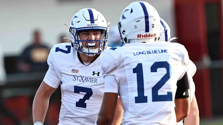 St. Xavier quarterback Chase Herbstreit reacts after scoring a touchdown. St. Xavier quarterback Chase Herbstreit reacts after scoring a touchdown.