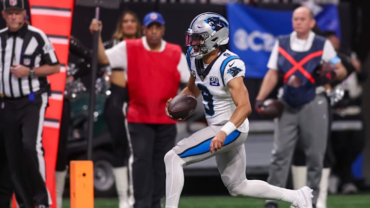 Jan 5, 2025; Atlanta, Georgia, USA; Carolina Panthers quarterback Bryce Young (9) runs the ball for a touchdown against the Atlanta Falcons in the fourth quarter at Mercedes-Benz Stadium. Mandatory Credit: Brett Davis-Imagn Images Jan 5, 2025; Atlanta, Georgia, USA; Carolina Panthers quarterback Bryce Young (9) runs the ball for a touchdown against the Atlanta Falcons in the fourth quarter at Mercedes-Benz Stadium. Mandatory Credit: Brett Davis-Imagn Images