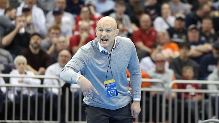 Penn State wrestling coach Cael Sanderson gives instructions during a Nittany Lions match. 