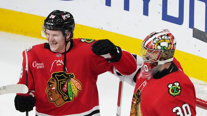 Apr 15, 2026; Chicago, Illinois, USA; Chicago Blackhawks goaltender Spencer Knight (30) and defenseman Ethan del Mastro (38) celebrate their win against the San Jose Sharks at United Center. Mandatory Credit: David Banks-Imagn Images