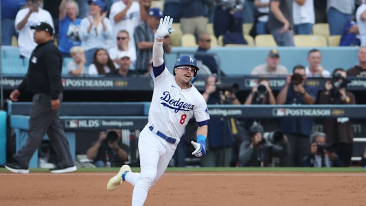Oct 11, 2024; Los Angeles, California, USA; Los Angeles Dodgers third baseman Enrique Hernandez (8) runs after hitting a solo home run in the second inning against the San Diego Padres during game five of the NLDS for the 2024 MLB Playoffs at Dodger Stadium. Mandatory Credit: Kiyoshi Mio-Imagn Images