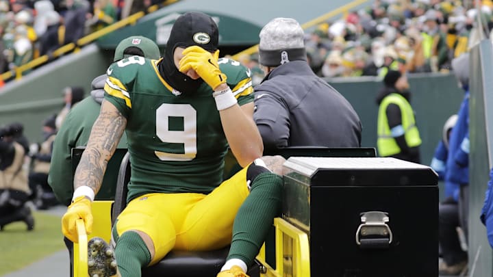 Jan 5, 2025; Green Bay, Wisconsin, USA; Green Bay Packers wide receiver Christian Watson (9) leaves the field on a cart after getting injured against the Chicago Bears in the second quarter during their football game Sunday, January 5, 2025 at Lambeau Field. Mandatory Credit: Dan Powers USA TODAY NETWORK-Wisconsin Jan 5, 2025; Green Bay, Wisconsin, USA; Green Bay Packers wide receiver Christian Watson (9) leaves the field on a cart after getting injured against the Chicago Bears in the second quarter during their football game Sunday, January 5, 2025 at Lambeau Field. Mandatory Credit: Dan Powers USA TODAY NETWORK-Wisconsin