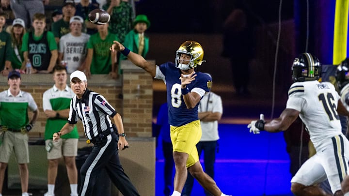 Sep 20, 2025; South Bend, Indiana, USA; Notre Dame Fighting Irish quarterback Kenny Minchey (8) throws a pass against the Purdue Boilermakers in the second half at Notre Dame Stadium. Mandatory Credit: Michael Caterina-Imagn Images Sep 20, 2025; South Bend, Indiana, USA; Notre Dame Fighting Irish quarterback Kenny Minchey (8) throws a pass against the Purdue Boilermakers in the second half at Notre Dame Stadium. Mandatory Credit: Michael Caterina-Imagn Images