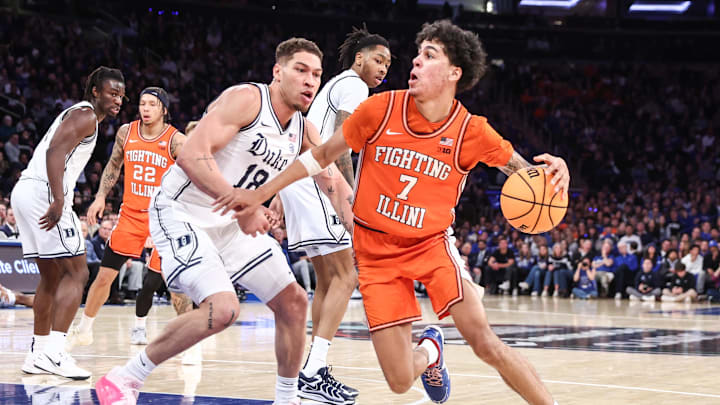 Feb 22, 2025; New York, NY, USA; Illinois Fighting Illini forward Will Riley (7) drives past Duke Blue Devils forward Mason Gillis (18) in the second half at Madison Square Garden. Mandatory Credit: Wendell Cruz-Imagn Images